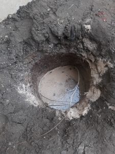 Earth well construction