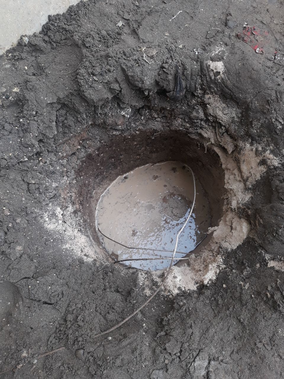 Earth well construction